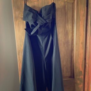 No sleeves, black jumpsuit with front bow NEW!
